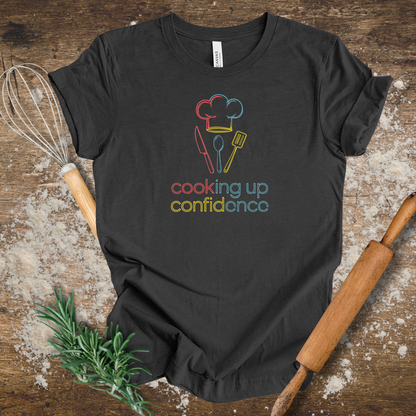 Cooking Up Confidence – Inspirational T-shirt for Chefs and Home Cooks in Dark Grey Heather
